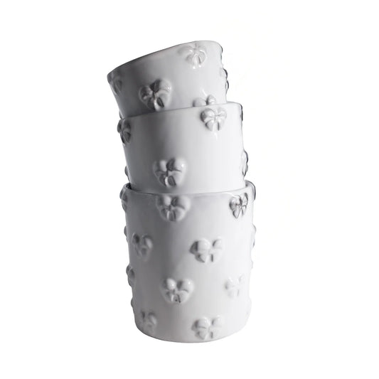 A collection of Carron Paris Nœud-Nœud tumblers in different sizes.