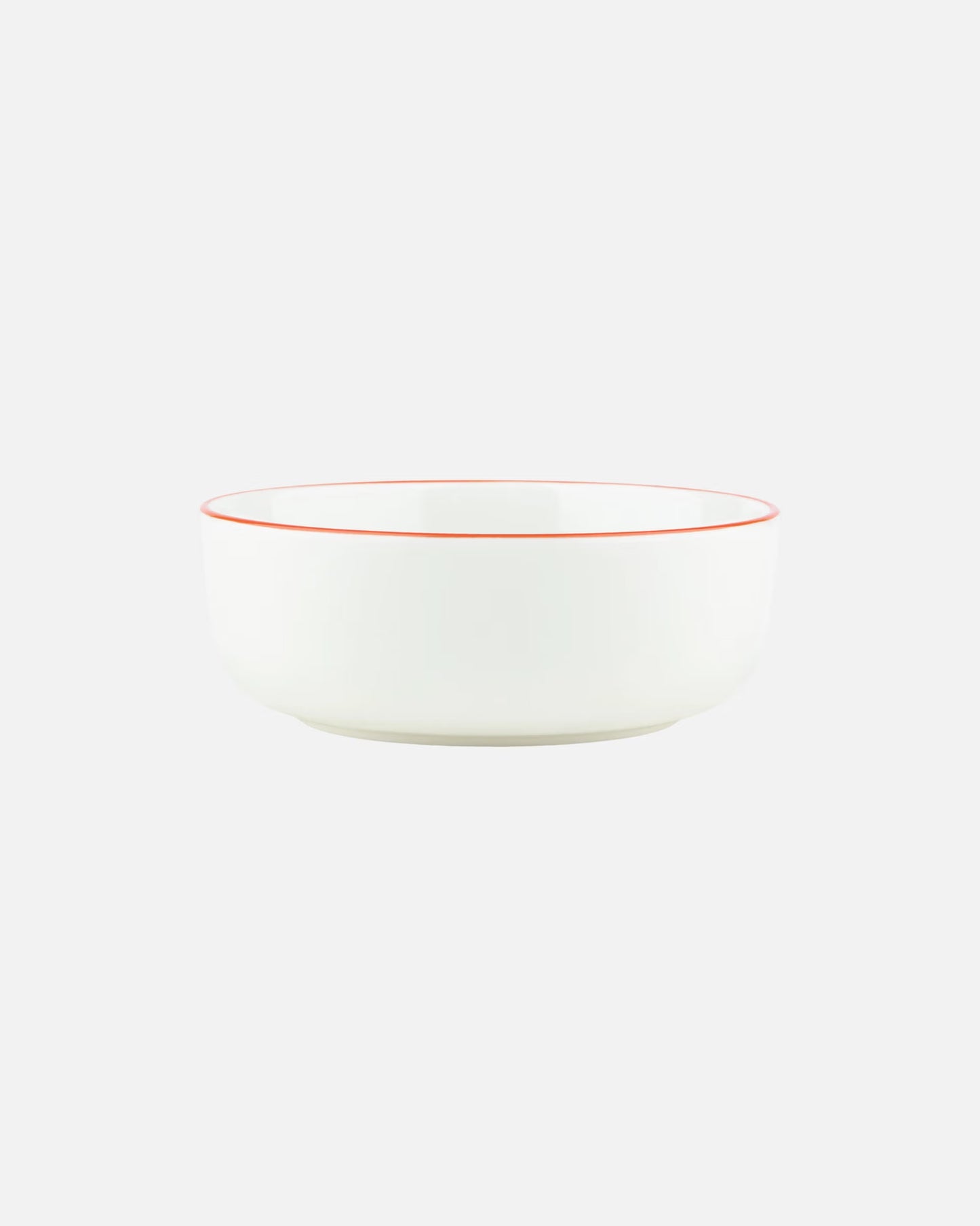 Aerial-angle view of the Marimekko Oiva 400ml white stoneware bowl featuring the iconic Unikko poppy print in light blue, orange, and red.