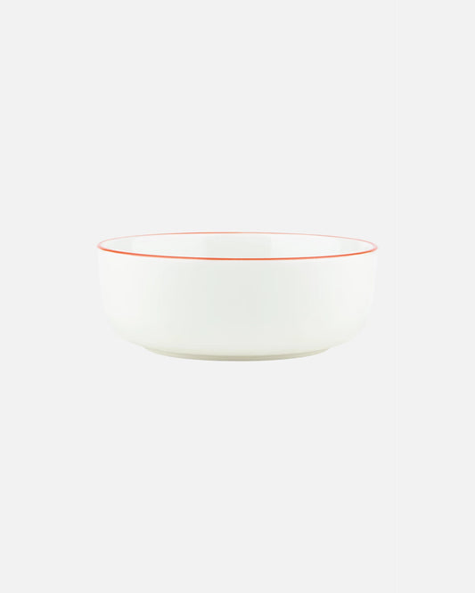 Aerial-angle view of the Marimekko Oiva 400ml white stoneware bowl featuring the iconic Unikko poppy print in light blue, orange, and red.