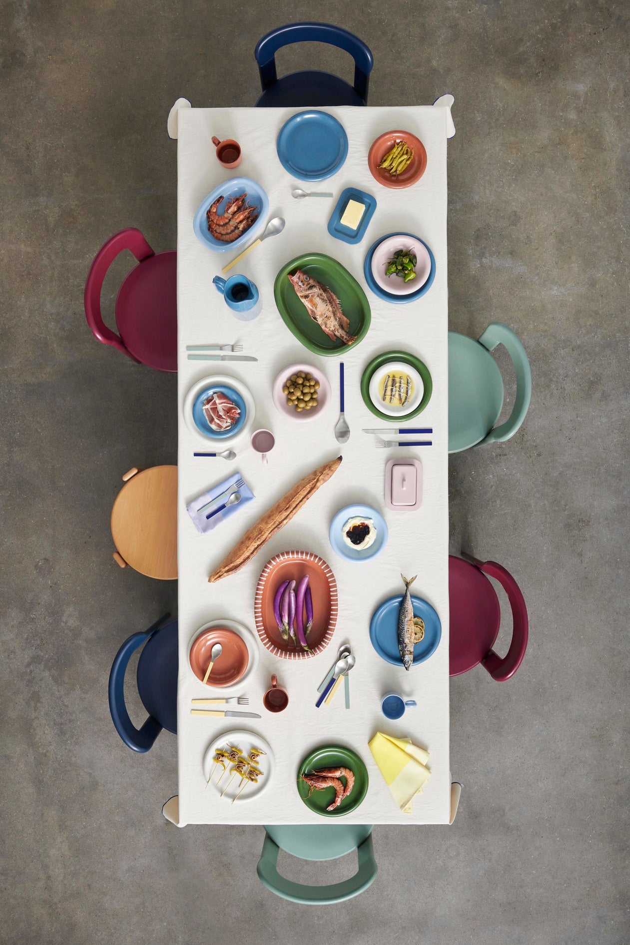 A table setting of Hay Barro collection, serving food.