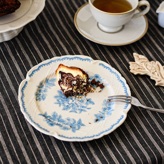 Studio M La Paix Rose floral ceramic plate served with slice of cake at afternoon tea