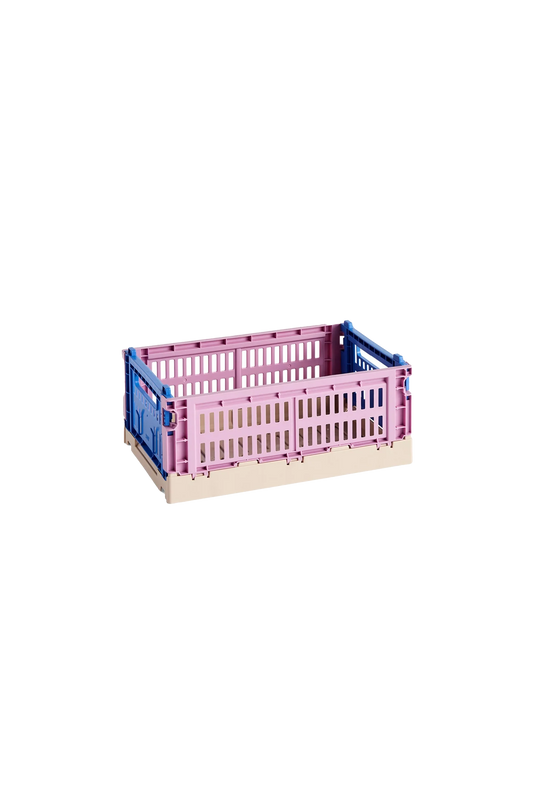 Side-angle view of the small HAY Colour Crate Mix in a beautifully muted dusty rose, showcasing its stackable, ventilated industrial design made from recycled plastic.