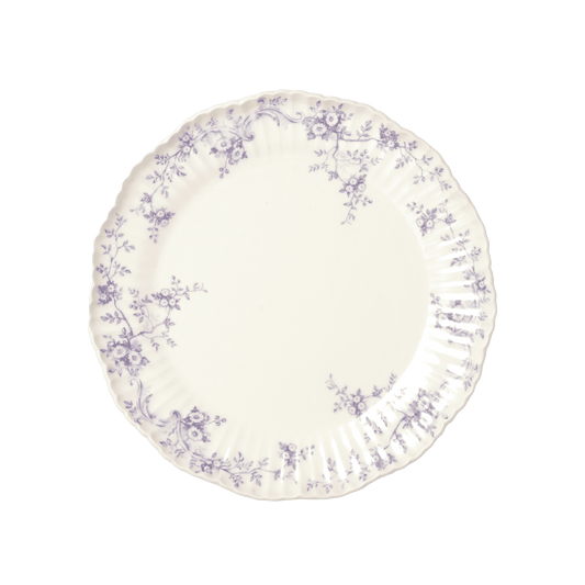 A pack shot of Studio M' Audrey 200 Plate in lavender porcelain, featuring a scalloped lace-like rim and an English garden-inspired floral relief pattern.