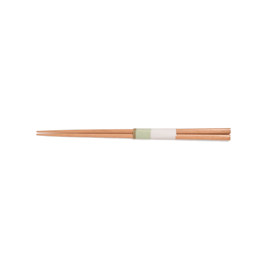 A pack shot of the back of Studio M' Maple Chopsticks 23cm featuring a sleek, slim profile and a smooth, pale blonde natural wood grain that brings light, airy warmth to the table.