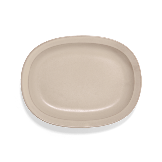 Studio M Karil 25cm oval earthenware plates in ecru colour.