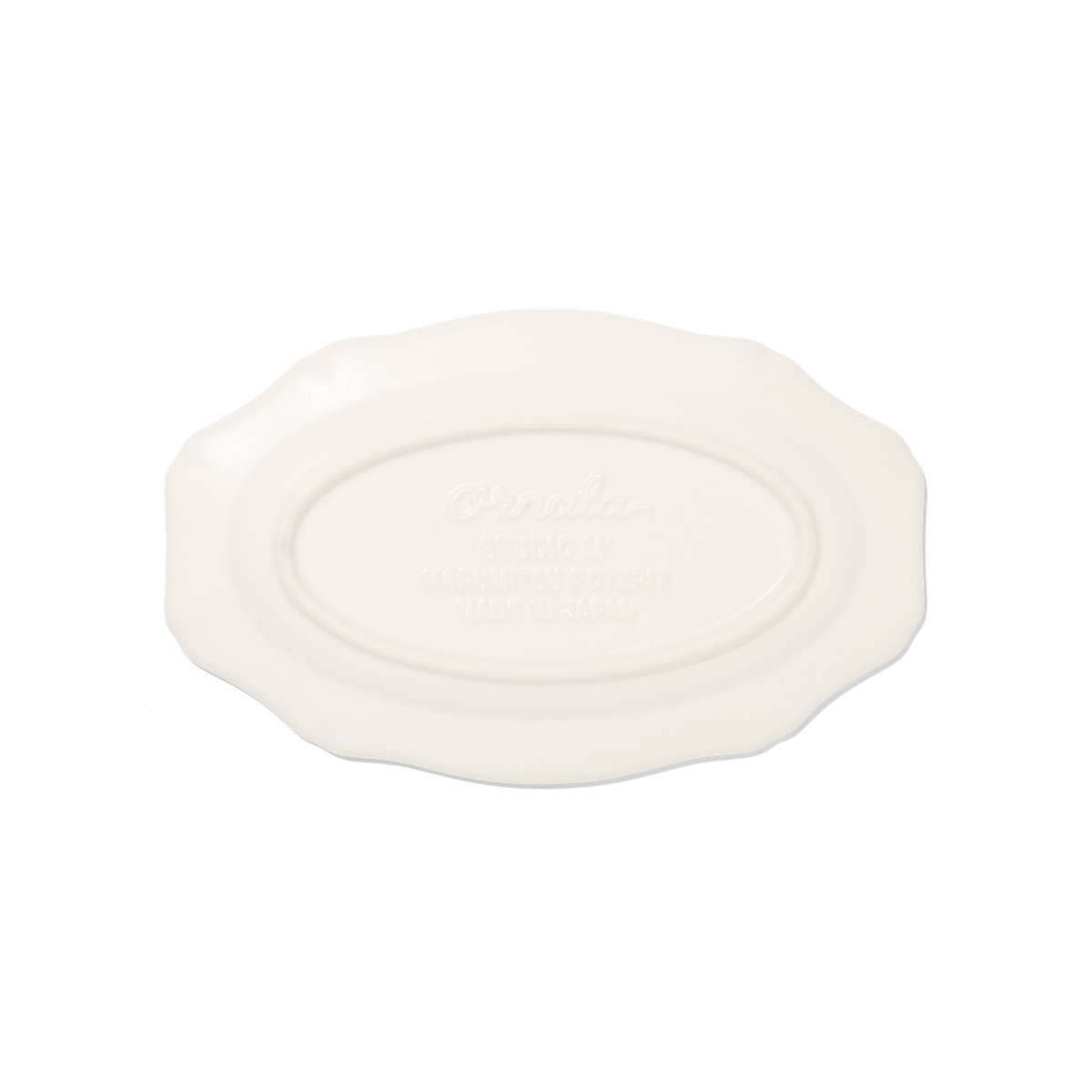 The base of Studio M Ornata matte white 20cm oval plate