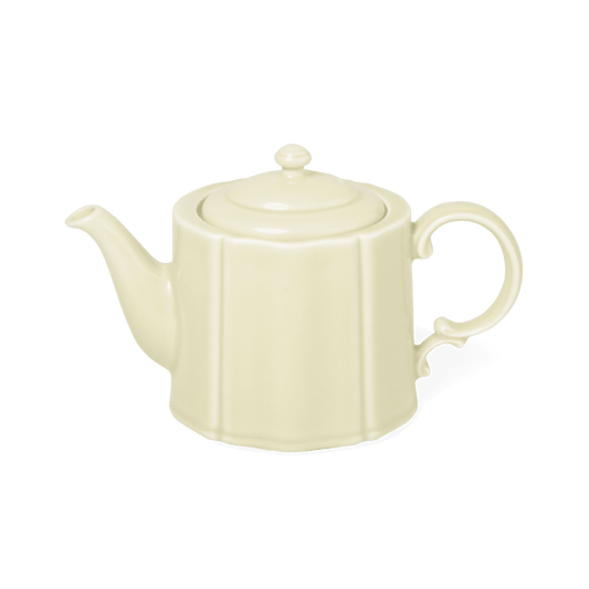 A pack shot of Studio M' Pungency Teapot in a soft pale green porcelain, featuring an elegant oval shape, refined curves, and a vintage-inspired vine-like handle.