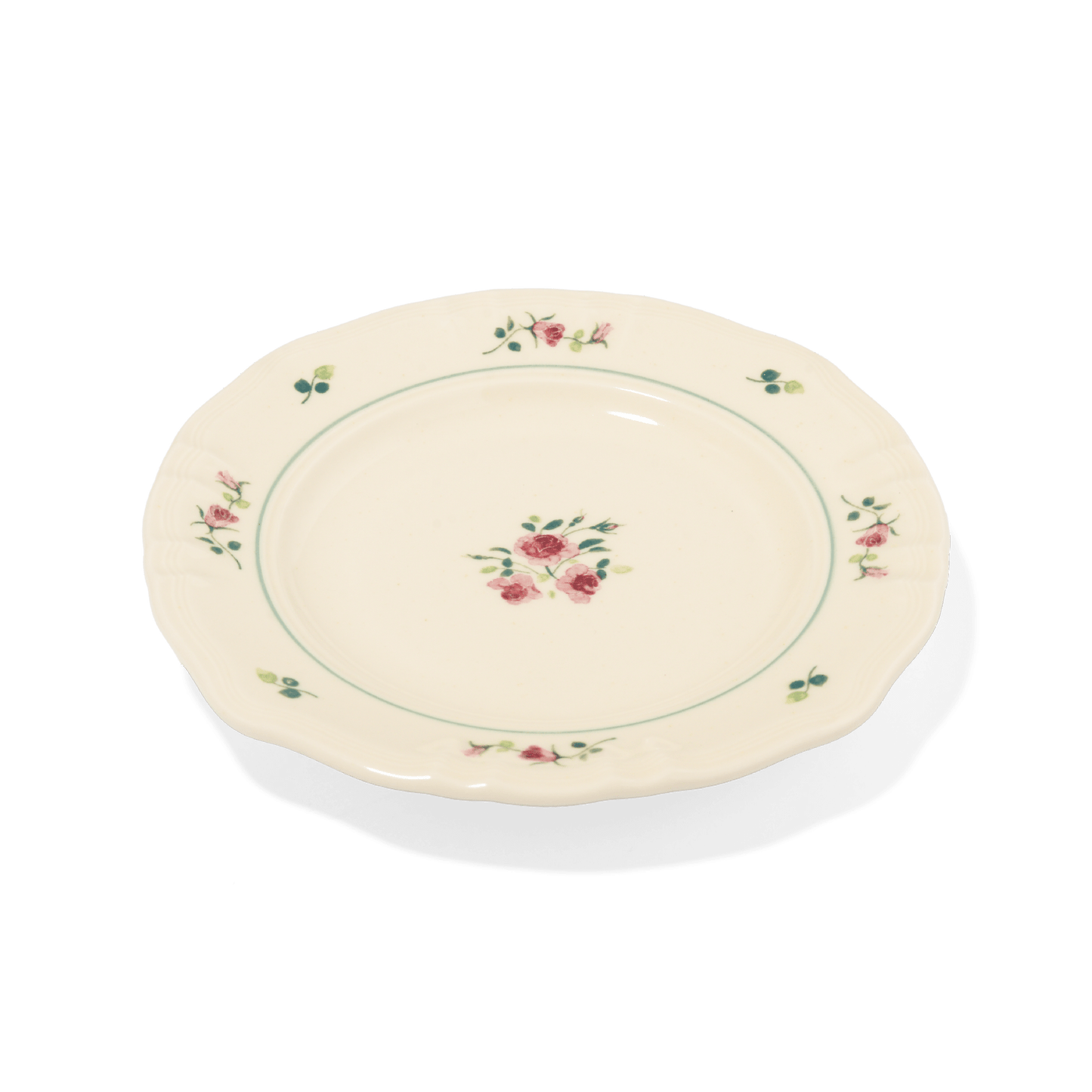 A pack shot of Studio M' Rosier Plate 16.5cm in a warm, subtle beige glaze, from a side angle.