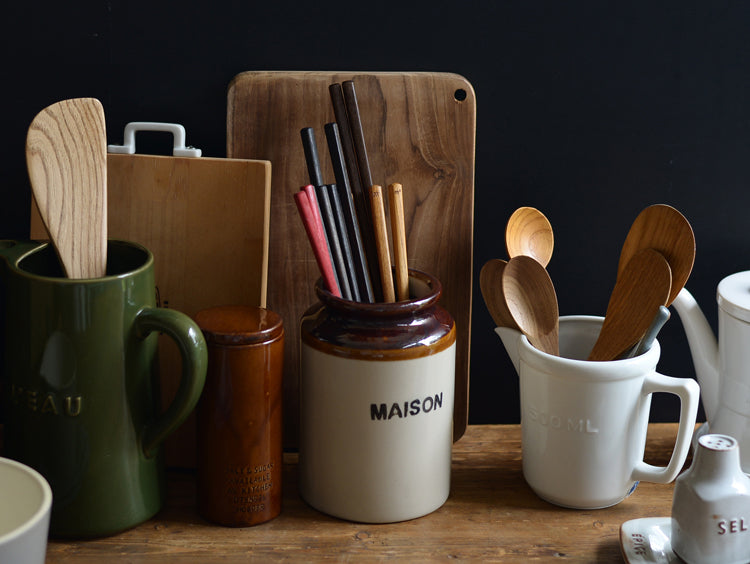 A lifestyle photo of Studio M' chopsticks range including Studio M' Lacquered Chopsticks 23cm in Black and Vermilion.