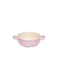 Side-angle view of the Riess 14cm porcelain enamel bowl in a soft pink, showcasing its robust, industrial chic silhouette.