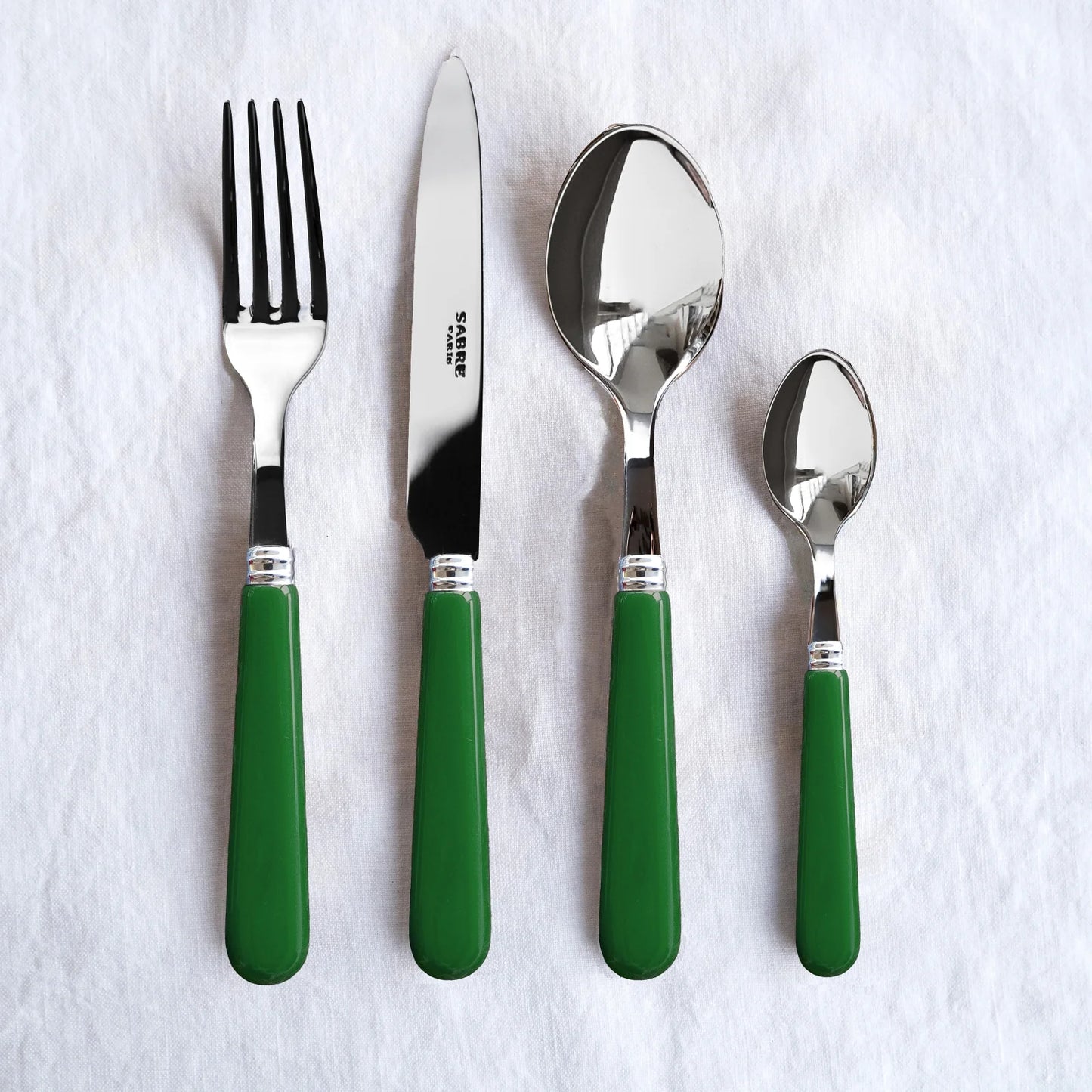 Flat-layered Sabre Paris Pop Unis 4 piece set in Green. 
