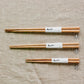 Studio M' Gros Chestnut Chopsticks 22.5cm comparing to small and medium sizes.