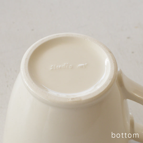 The base of Studio M' Creamware Latte Mug.
