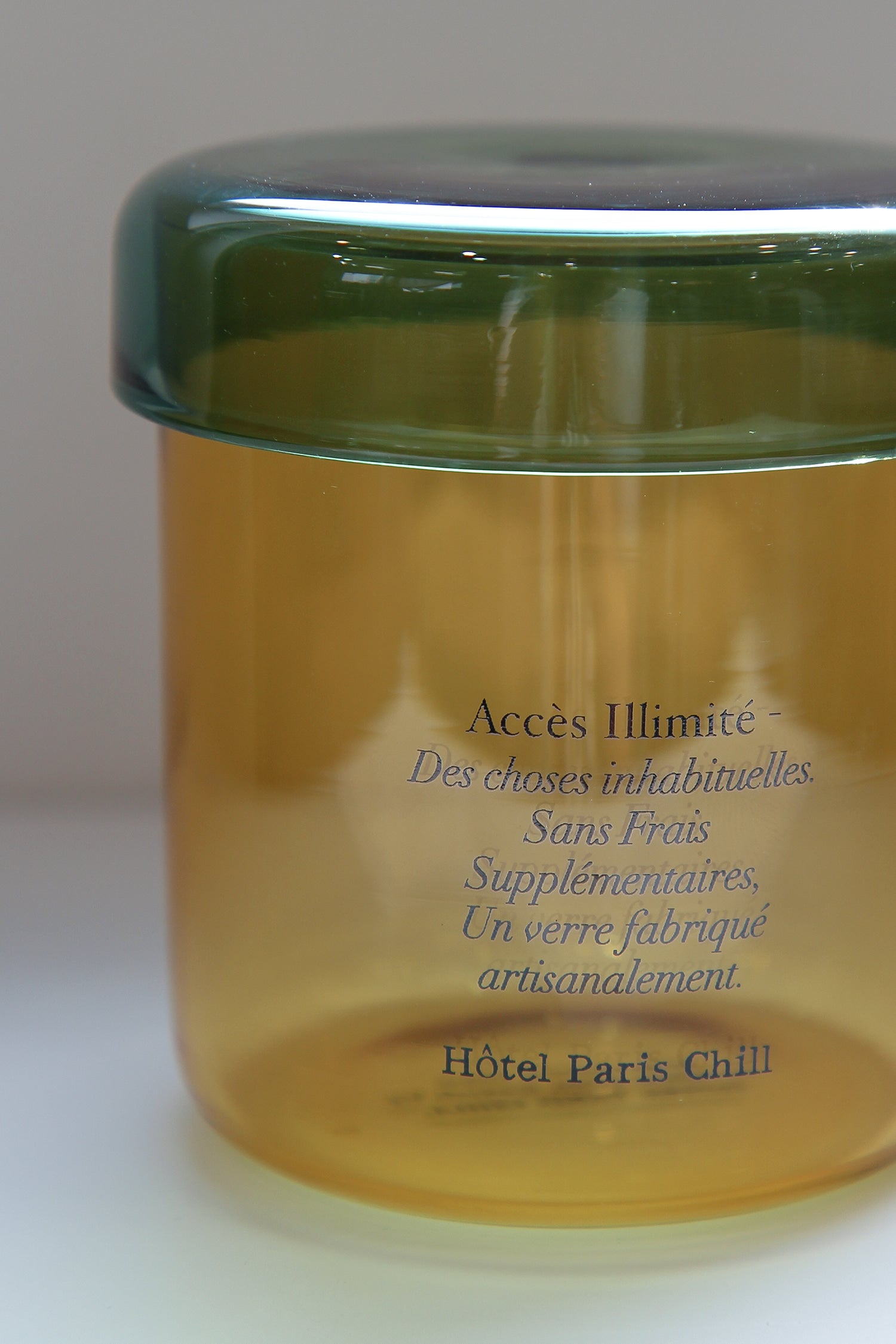 Close-up of HÔTEL827 Overhaze Vanilla mouth blown borosilicate glass jar container with lid