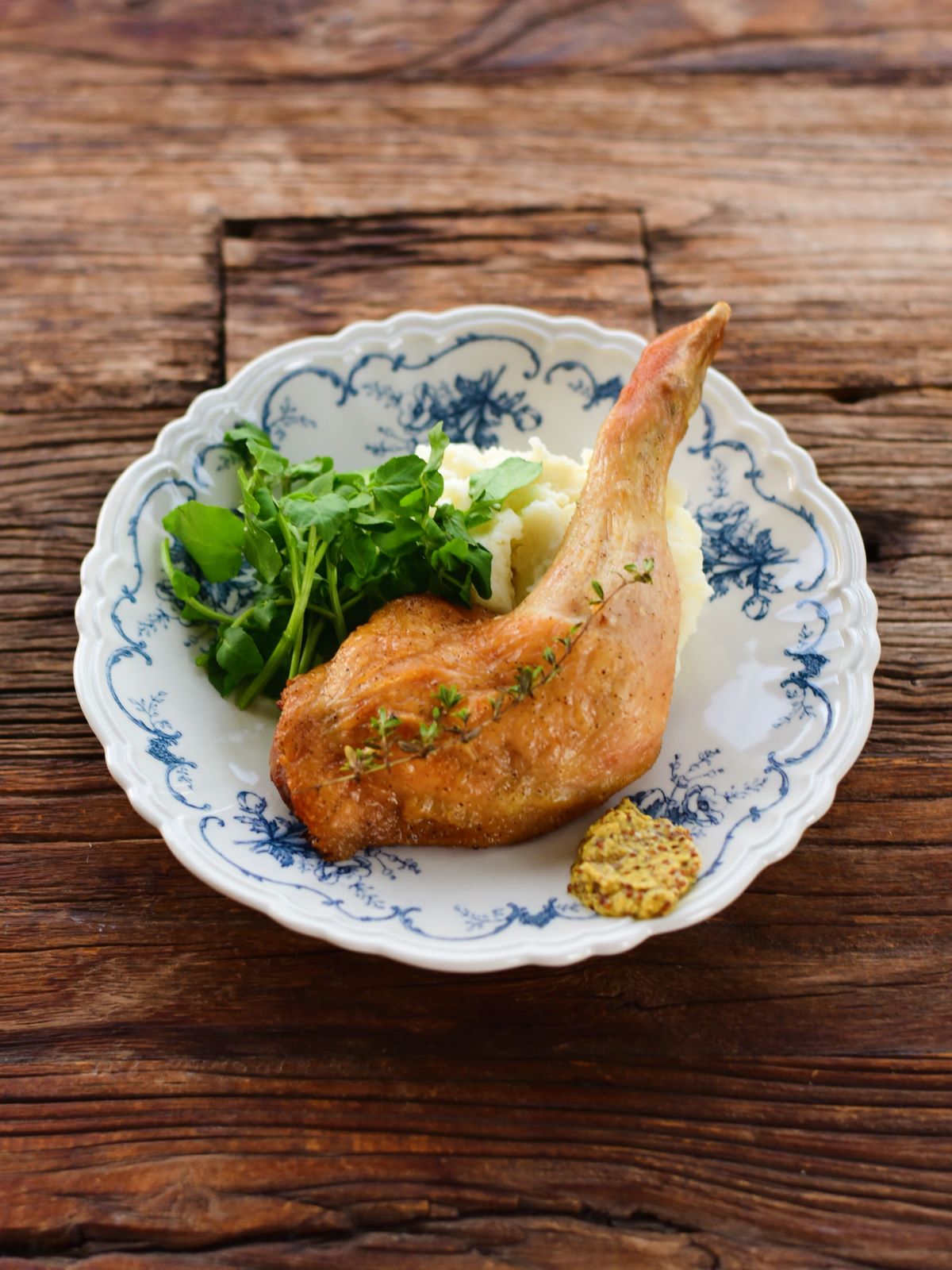 Studio M' Moment Plate 24cm in a beautiful blue glaze, serving lunch. 
