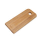 Side view of David Mello small ash cutting board with hole.