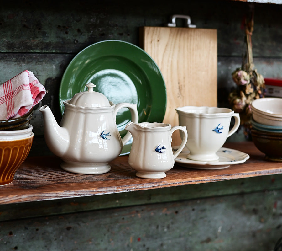 Studio M Early Bird collection on a kitchen shelf. 