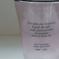 Close-up of mouth-blown organic glass ripples and graphic on HÔTEL827 pink cup