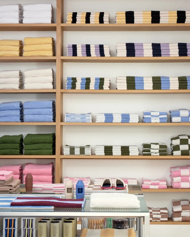 A shot of the Hay cotton towels collection, available in different sizes and colours.