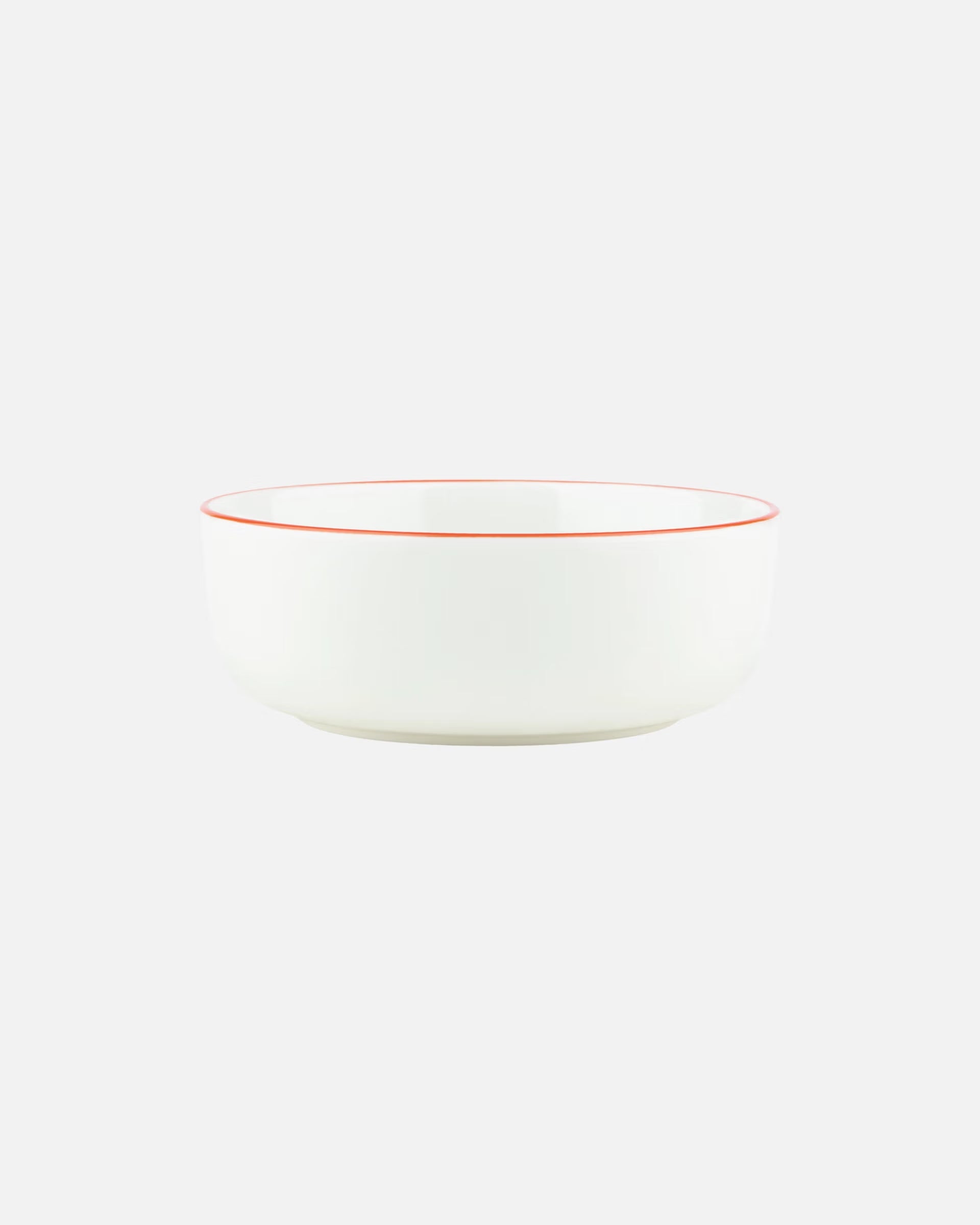 Aerial-angle view of the Marimekko Oiva 400ml white stoneware bowl featuring the iconic Unikko poppy print in light blue, orange, and red.