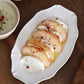 Studio M Ornata matte white 20cm oval plate with afternoon dessert.