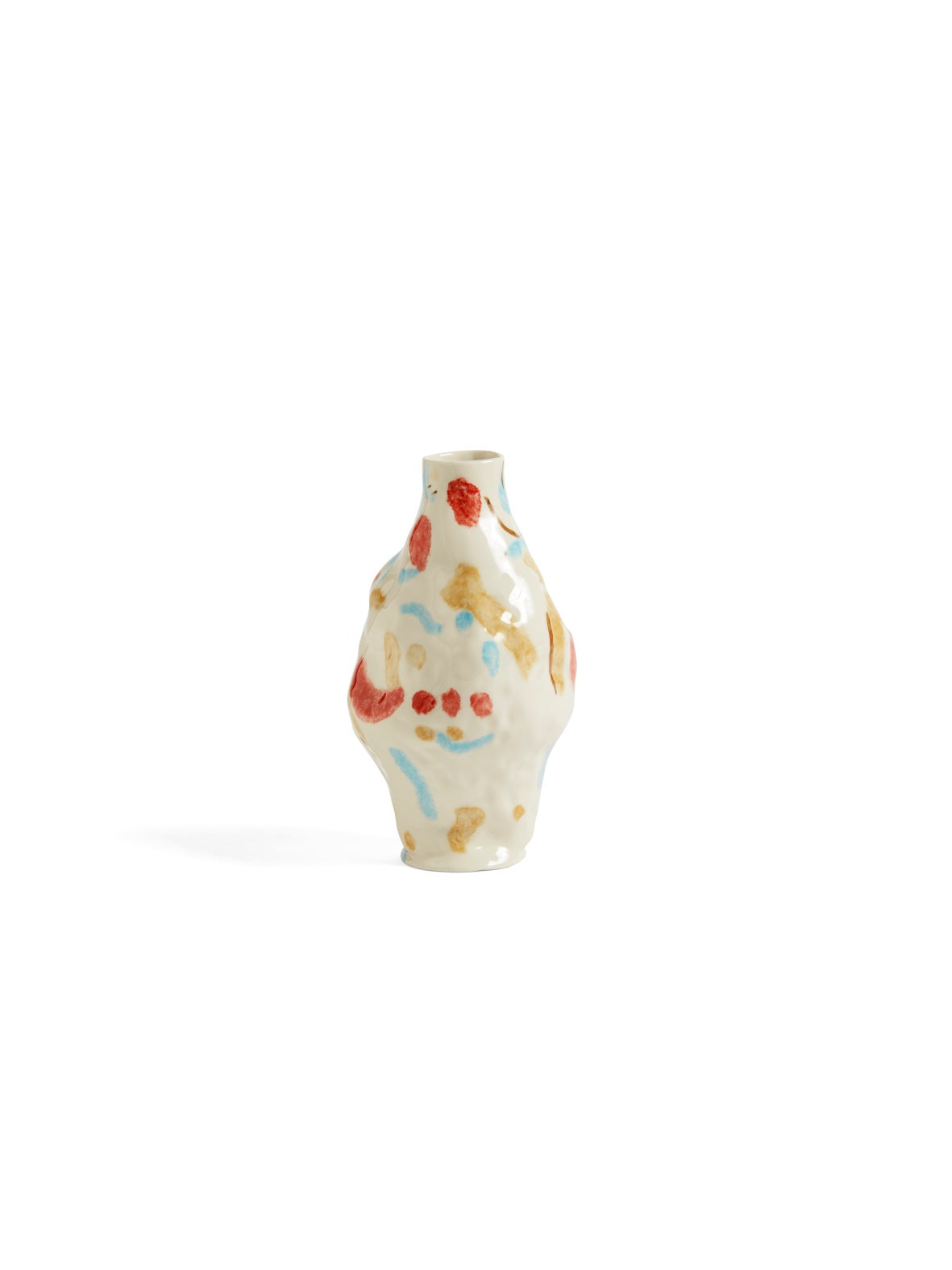 Side-angle view of the HAY Jessica Hans stoneware vase in the Miro colorway, showcasing its deliberately uneven, organic shape and hand-painted, abstract multicolored pattern.