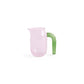 Side-angle view of the small pink HAY borosilicate glass jug designed by Jochen Holz, highlighting its distinctive asymmetrical rim and downward-curved handle.