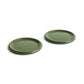 Side angle of two large 24cm HAY Barro terracotta dinner plates showcasing a fresh high-gloss green glaze and distinctive natural rolled edges in Green.
