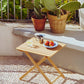 A modern table setting featuring light blue Hay Barro bowl in the balcony.