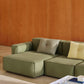 HAY Dot Cushions styled on contemporary green sofa.