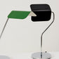 Hay Apex Desk Lamp in Emerald Green paired with Hay Apex table lamp in iron black.