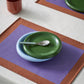 Hay Barro Plate 18cm in Green stacked on ont top Hay Barro Bowl in light blue. 