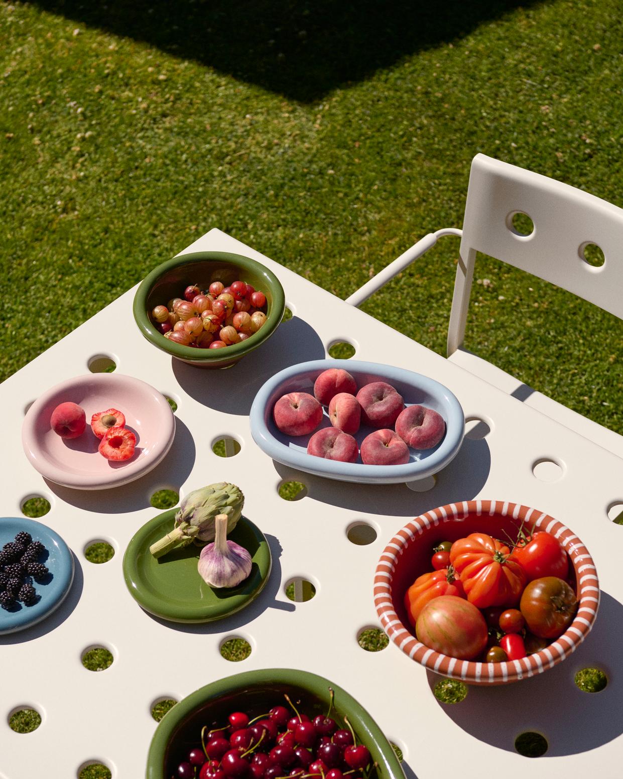A table setting of Hay Barro collection. 
