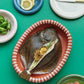 Hay Barro plate 18cm in dark blue in a table setting.