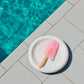 Pink popsicle on Hay Barro plate 18cm in Off-White by a pool