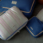 Hotel827 cotton travel pouches in different patterns and sizes.