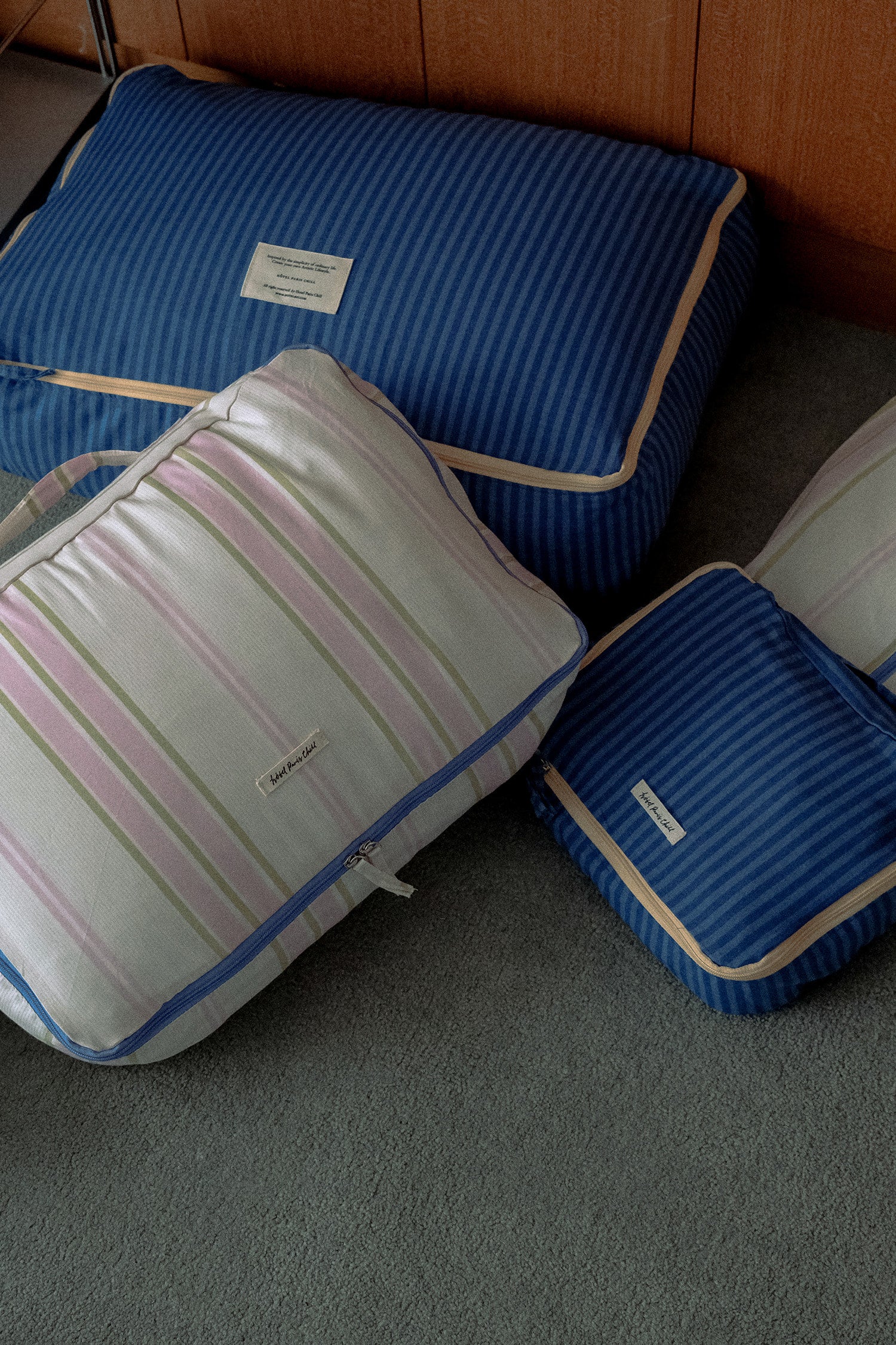 Hotel827 cotton travel pouches in different patterns and sizes.