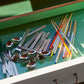 A lifestyle shot of four pairs of HAY Colour Sticks crafted from bamboo, together with Hay stainless steel cutlery.