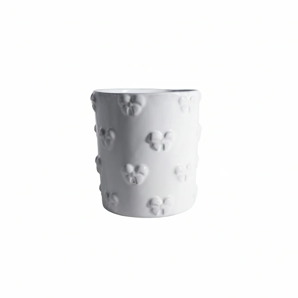 Large Carron Paris Nœud-Nœud tumbler in white enameled terracotta.