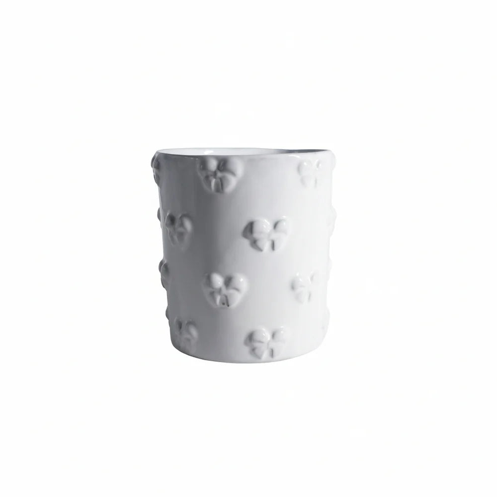 Large Carron Paris Nœud-Nœud tumbler in white enameled terracotta.