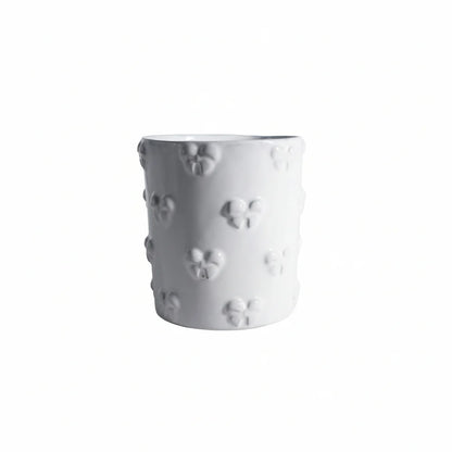 Large Carron Paris Nœud-Nœud tumbler in white enameled terracotta.