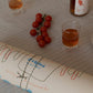 A closeup shot of the art print Poetica by Das Rotes Rabbit exclusively created for The Poster Club, wrapped up.