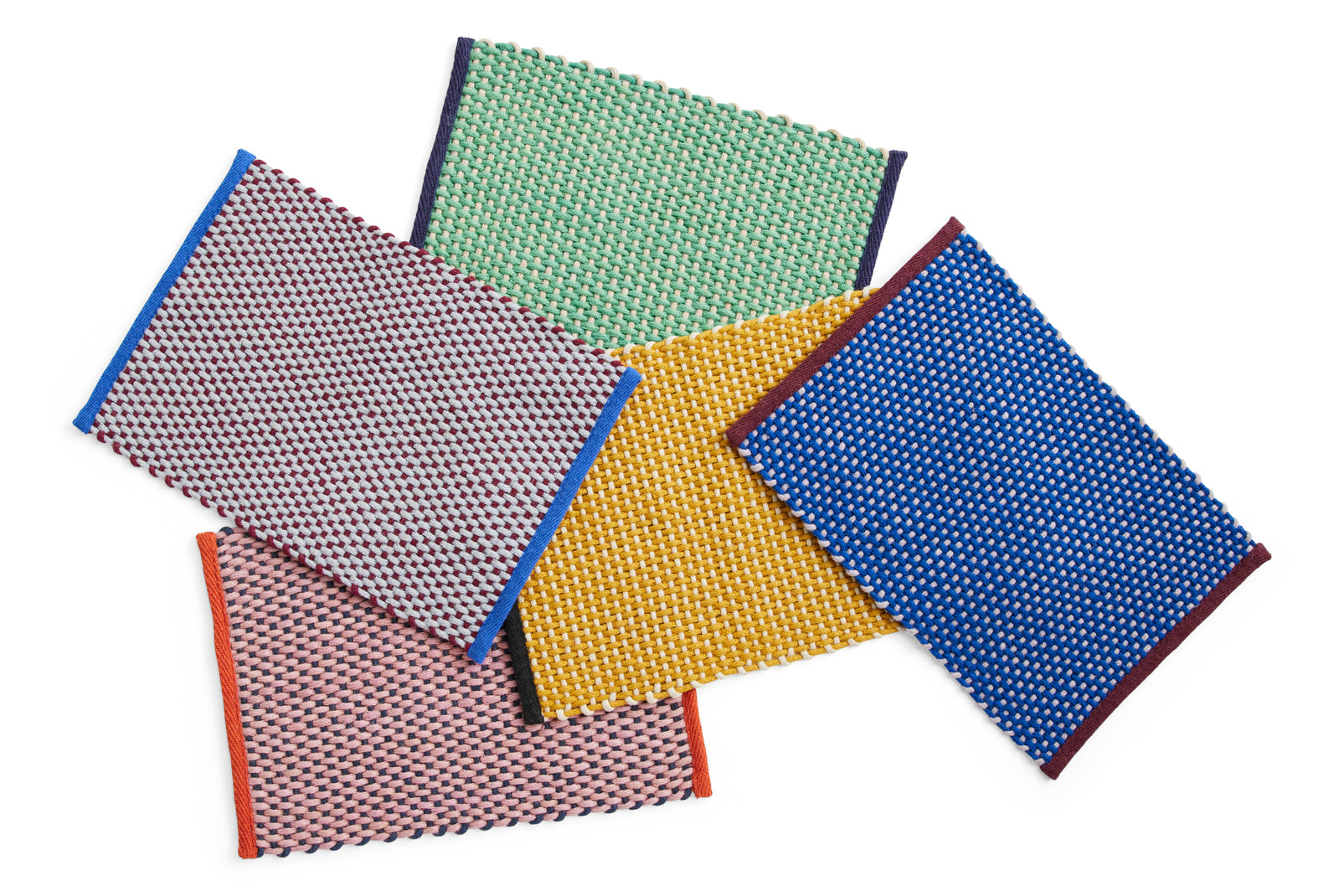 A pack shot of the Hay door mats, available in 5 colours.