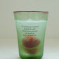 Iced drink served in HÔTEL827 Olive green tinted glassware.