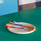 A lifestyle shot of four pairs of HAY Colour Sticks crafted from bamboo, showcasing their vibrant, multicolored lacquered handles arranged on a clean surface.