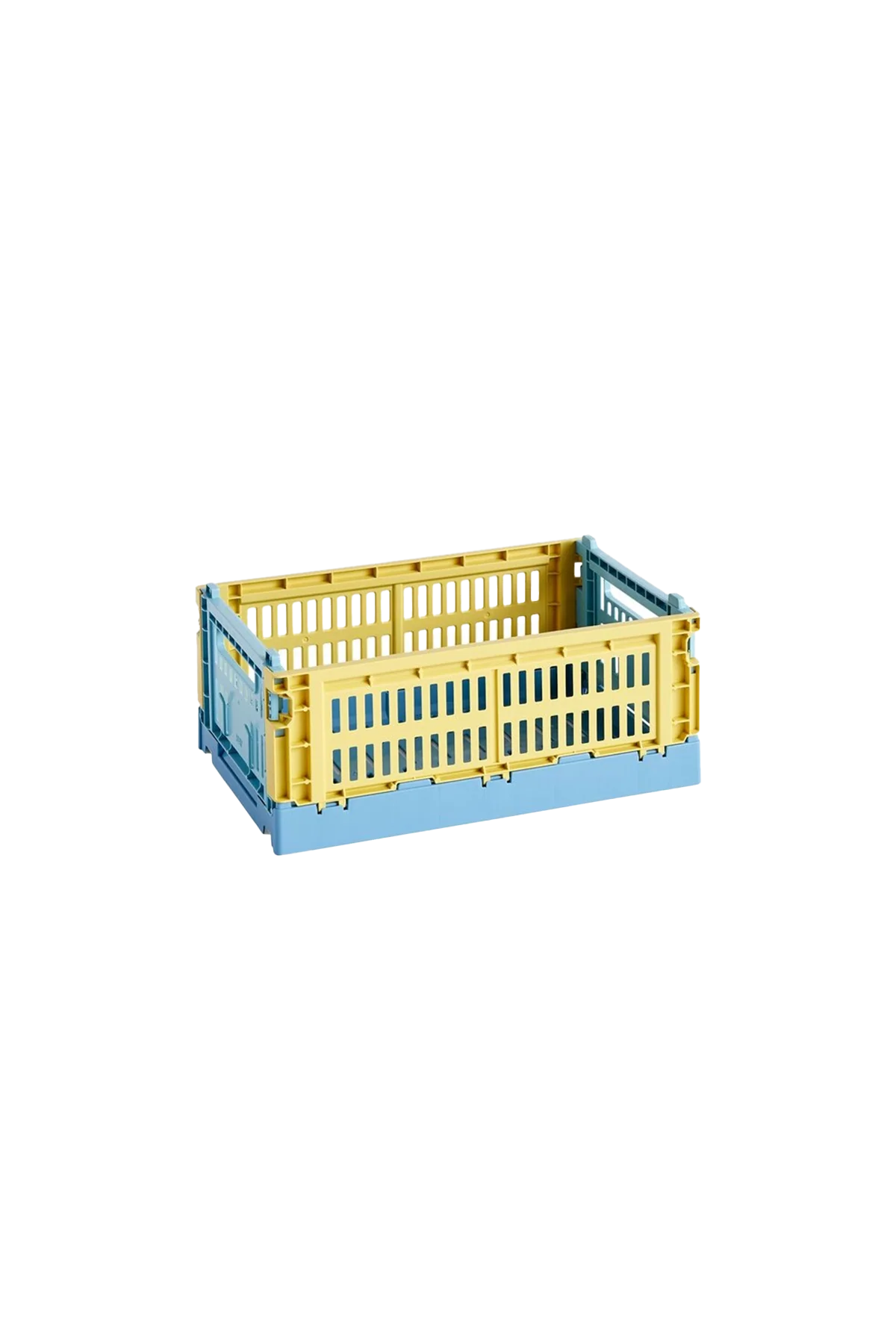 Side-angle view of the small HAY Colour Crate Mix in a muted dusty yellow, showcasing its stackable, ventilated industrial design made from recycled plastic.
