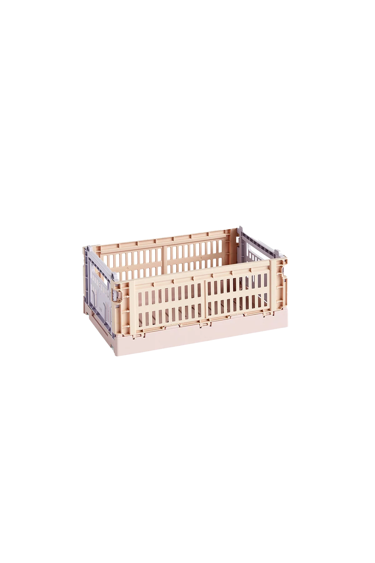 Side-angle view of the small HAY Colour Crate in a soft powder hue, showcasing its stackable, ventilated industrial design made from recycled plastic.
