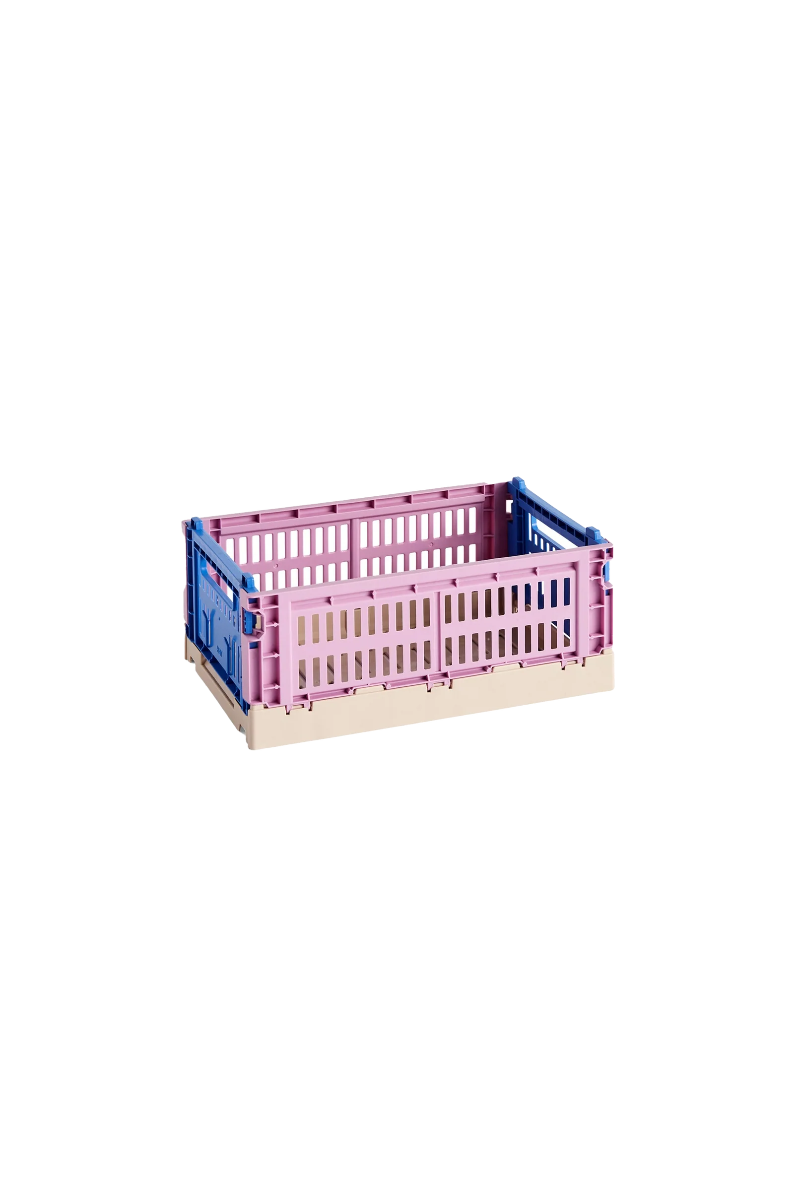 Side-angle view of the small HAY Colour Crate Mix in a beautifully muted dusty rose, showcasing its stackable, ventilated industrial design made from recycled plastic.
