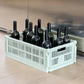 Hay Large Colour Crate in mint, storing wine bottles. 