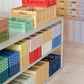 Displayed Hay Colour Crates in a shop, available in different colours and sizes.